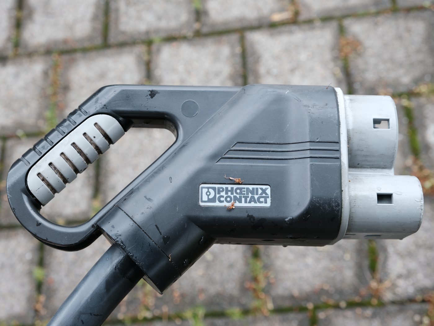 CCS Type 2 Combo fast-charging plug — the standard connector used by every non-Tesla DC charger in Denmark