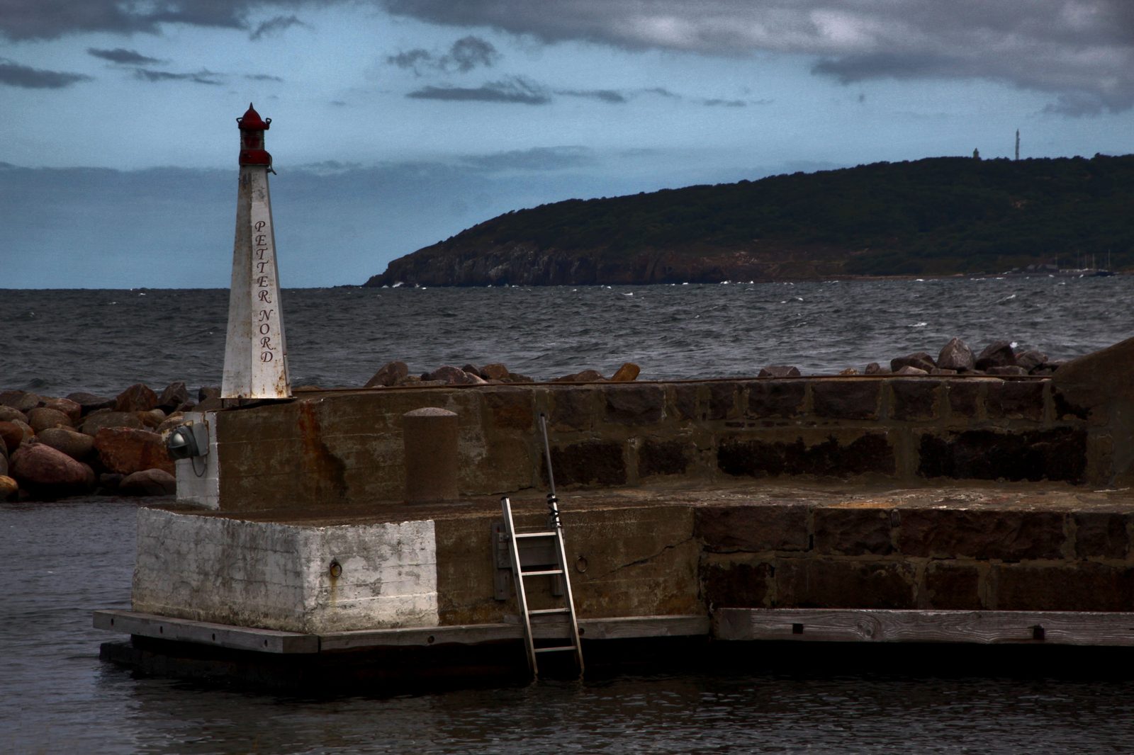 Vang Havn on Bornholm’s rocky west coast — small harbour tucked beneath granite cliffs