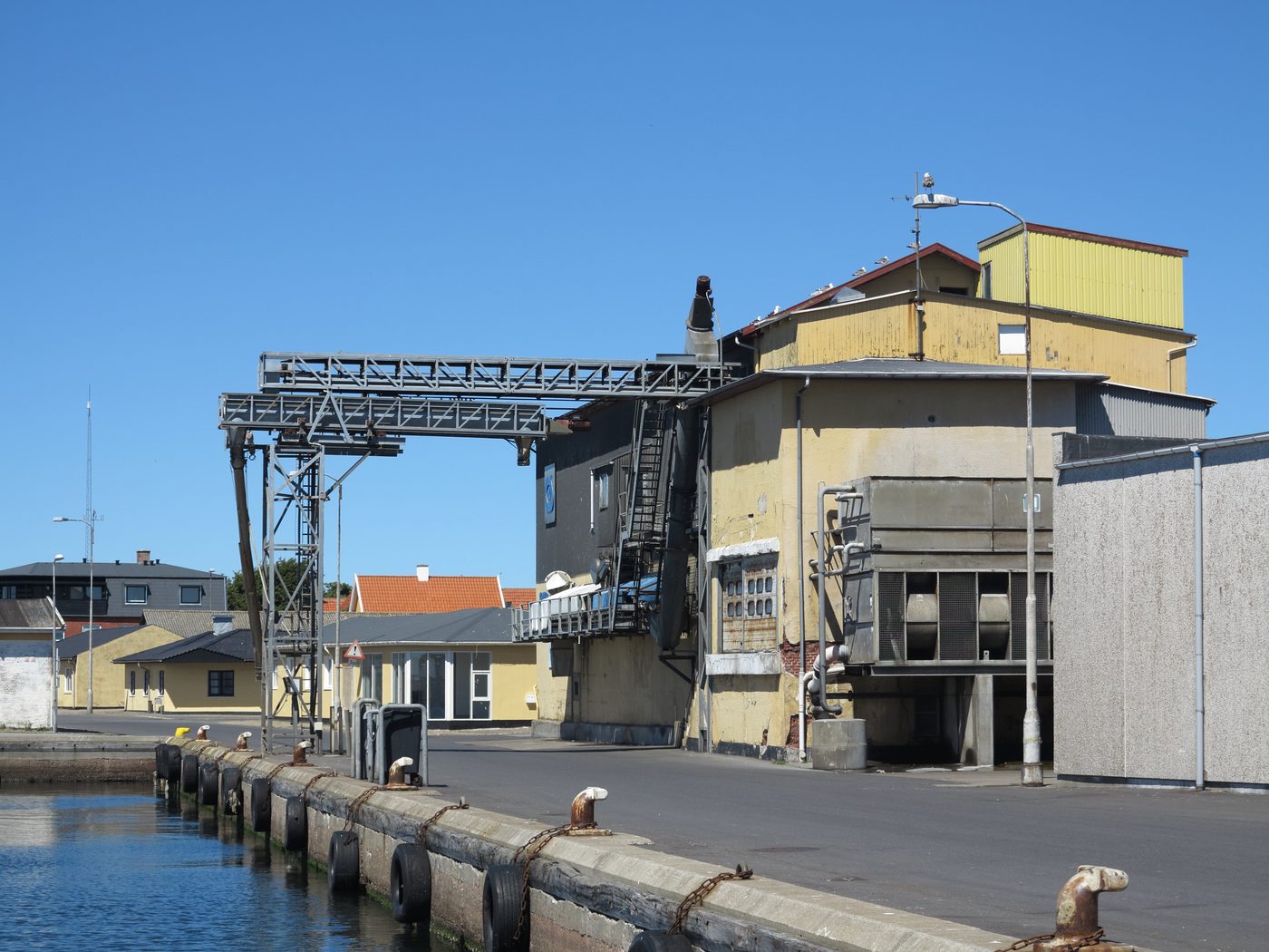 Skagen harbour — fishing boats, the old iceworks building, low northern light