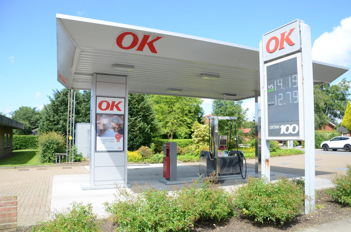 OK tankstation in Agerbæk, Denmark — a small-town Danish filling station with the OK price-sign visible at dusk