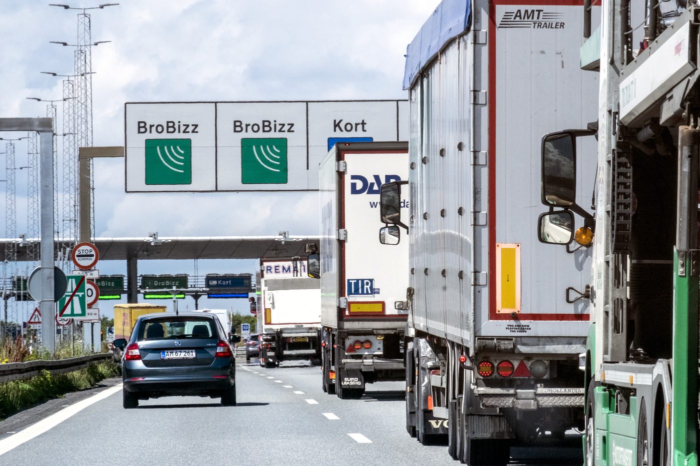 Storebælt toll plaza — multiple lanes with overhead signage showing payment options
